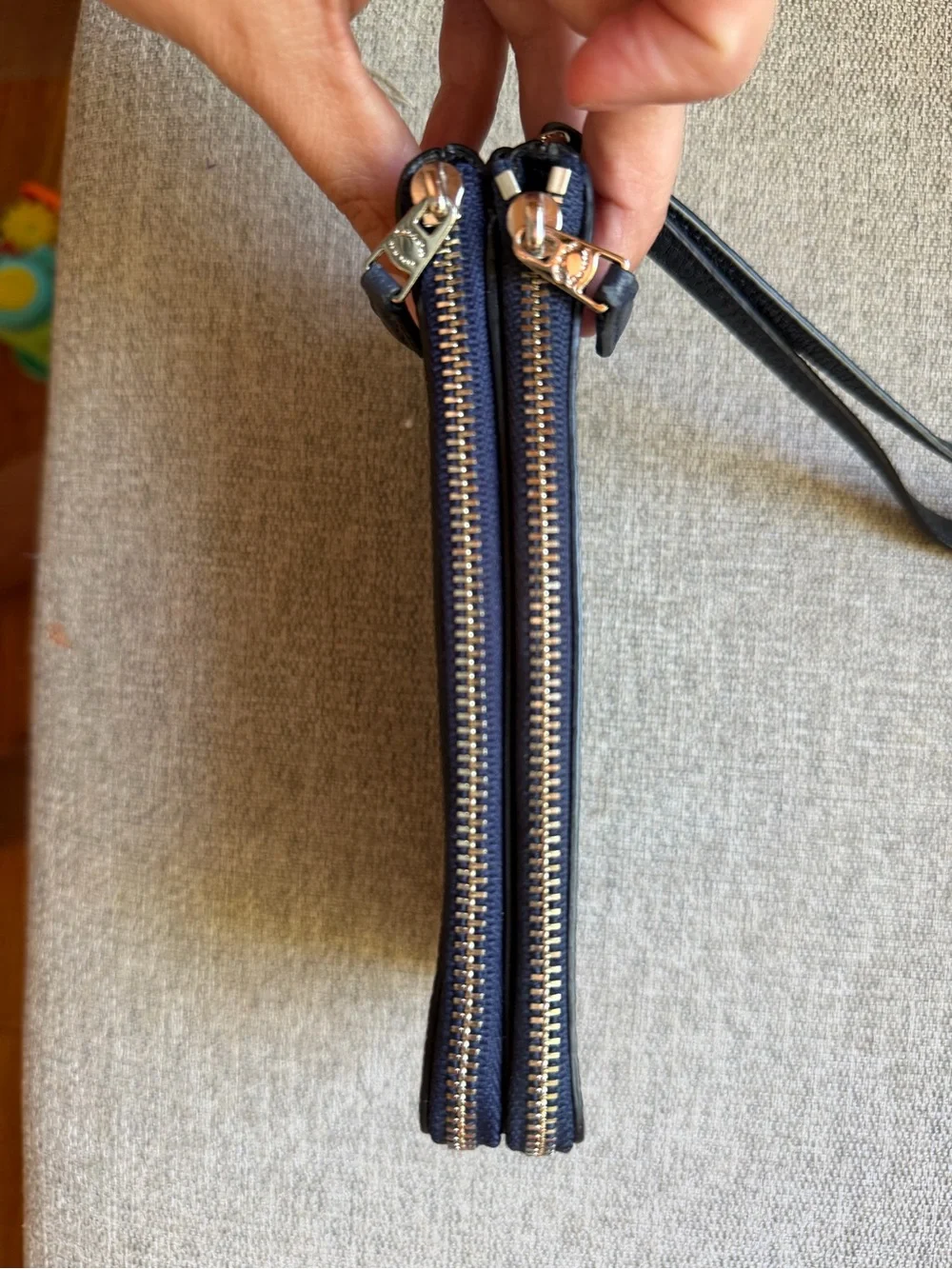 Coach Navy Pebbled Leather Wristlet with Gold Logo